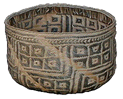 [Rossel Island betel-nut basket with plaited design in grey-green and gold: 18k]