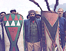 [John with two Highlands shields from the Mt. Hagen area: 22k]