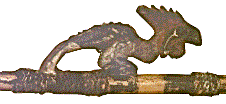 [Detail of atlatl thumb guide in the shape of a rooster: 5k]