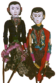 [2 aristocratic female rod puppets in traditional dress and hairdos: 26k]